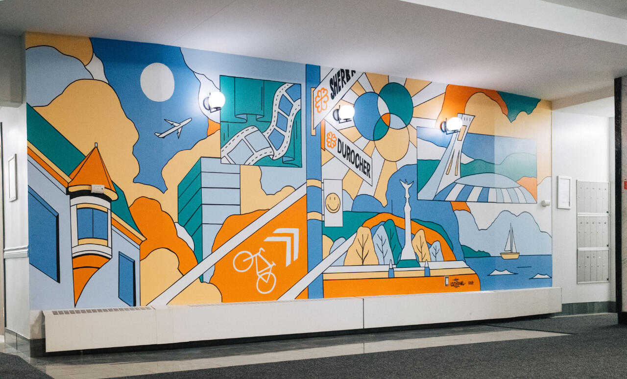 Une murale représentant Montréal et les attraits du quartier de Milton Park.