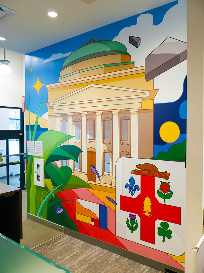 Une murale imprimée de l'artiste Lucas Saenger, représentant des bâtiments de Montréal ainsi que sa canopée.